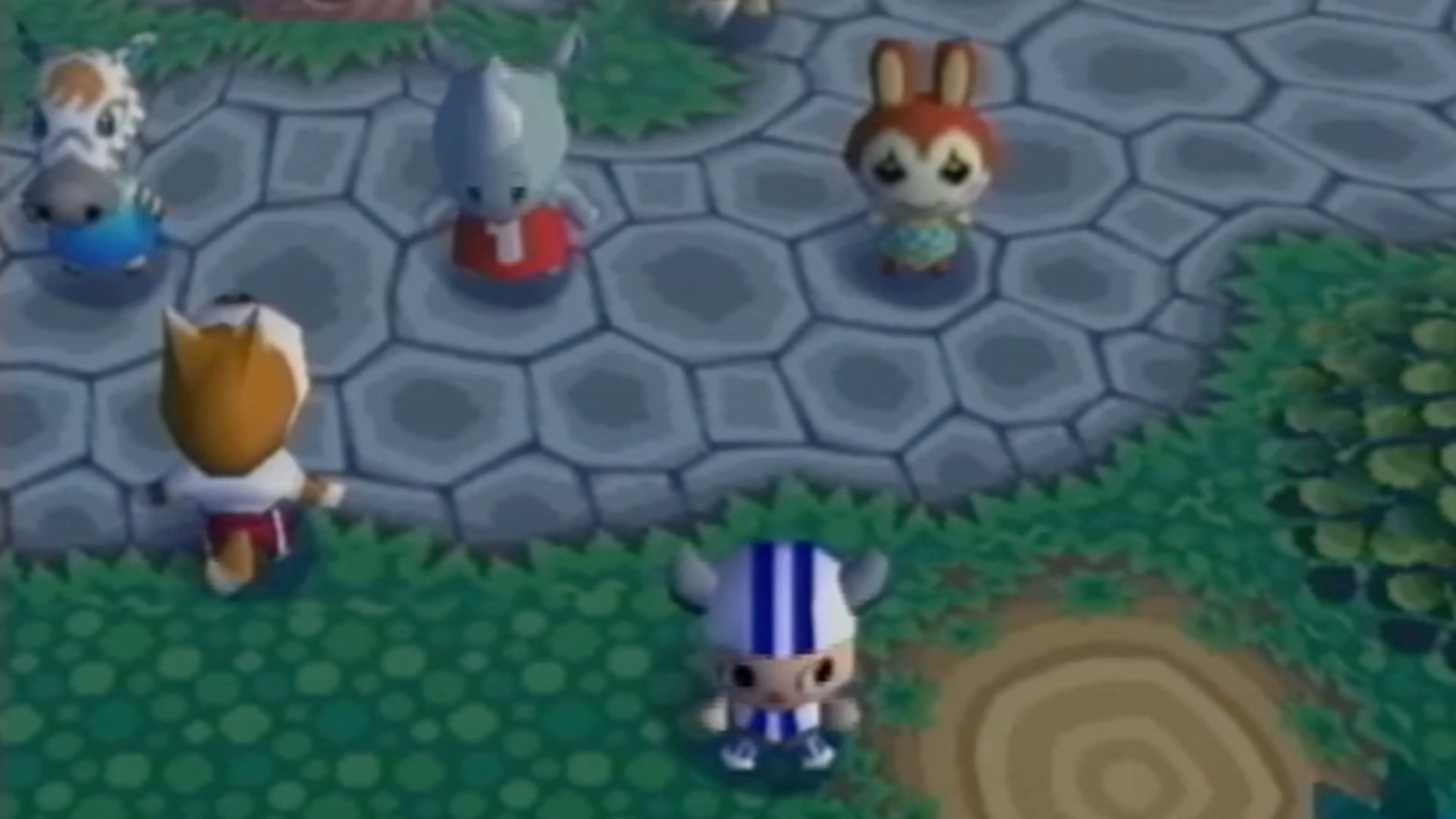 Ảnh chụp màn hình Animal Crossing GameCube với ngôi nhà và cây cối, thể hiện phong cách đồ họa.