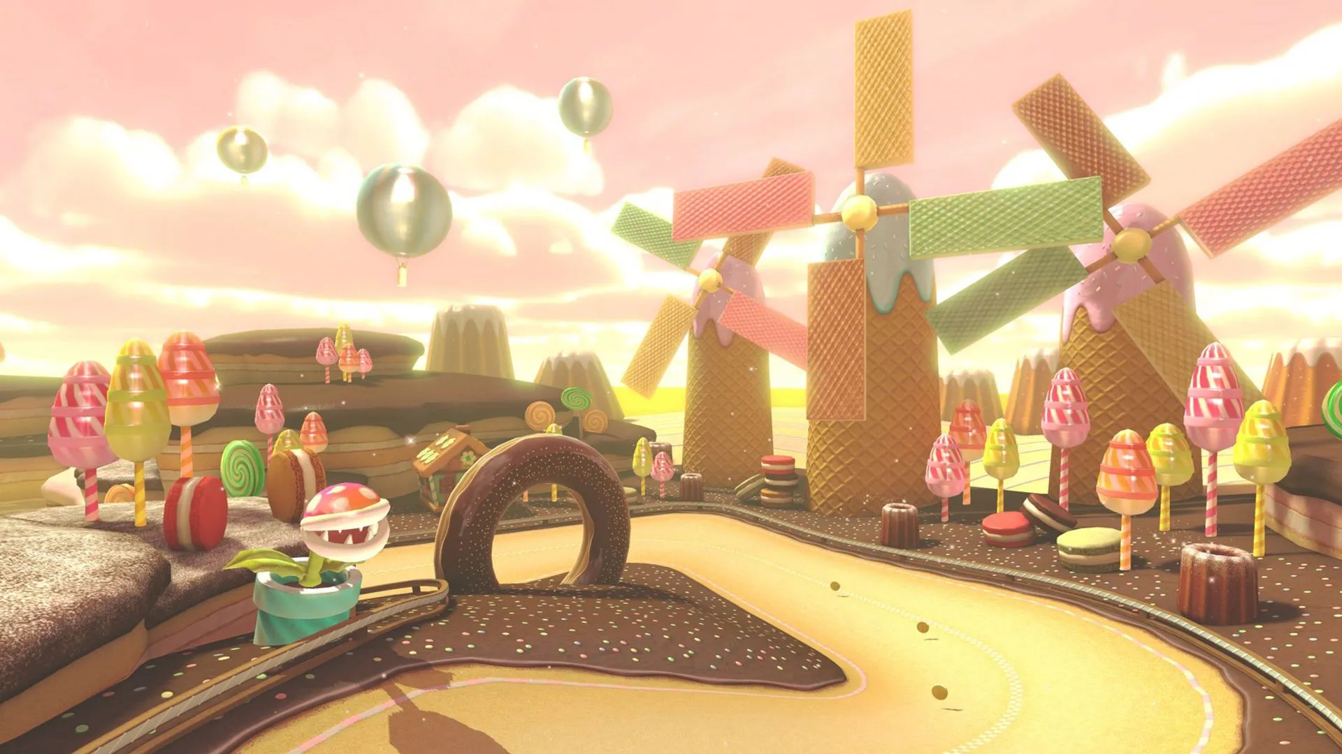 Cảnh giới thiệu đường đua Sweet Sweet Canyon trong Mario Kart 8 Deluxe với chủ đề kẹo ngọt rực rỡ.