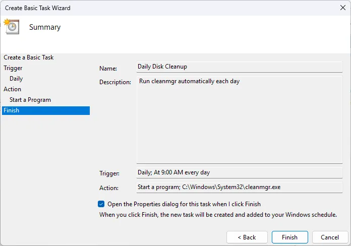 Cửa sổ thuật sĩ Task Scheduler hiển thị các cài đặt cho một tác vụ mới, minh họa việc thiết lập tự động hóa bảo trì hệ thống.