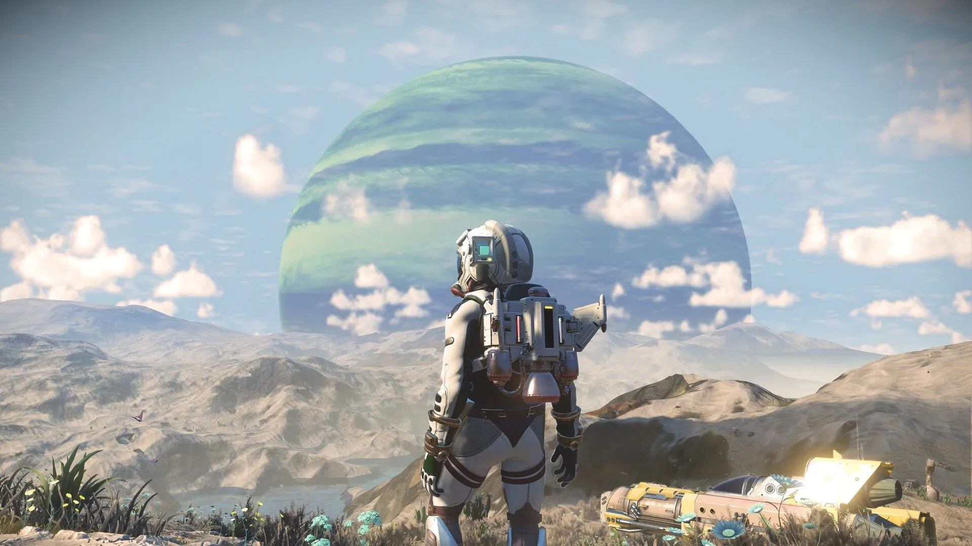 Góc nhìn thứ ba của một nhân vật trong bộ đồ không gian nhìn ra hành tinh ngoài hành tinh trong game No Man's Sky.