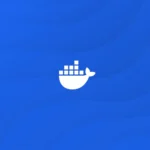 Logo Docker màu trắng trên nền xanh dương, biểu tượng của công nghệ container hóa.
