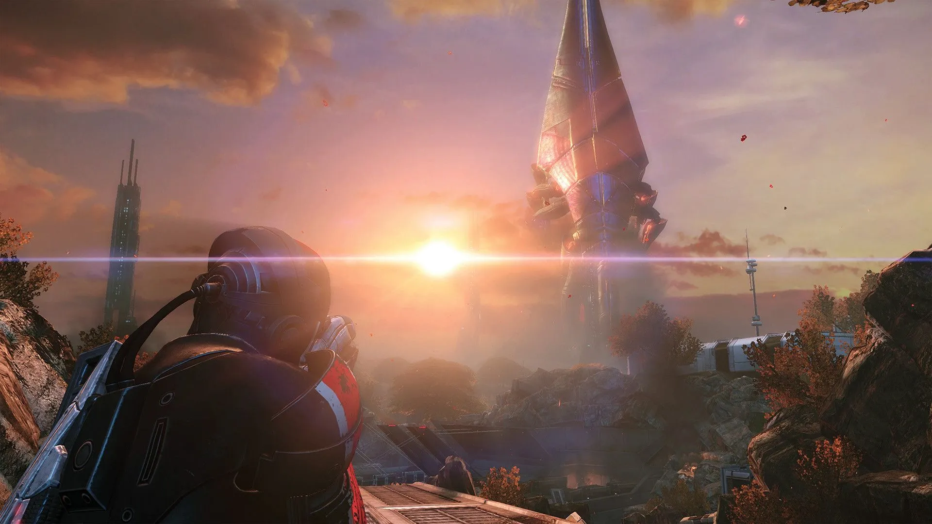 Một phân cảnh hành động trong Mass Effect 3 với hai nhân vật chiến đấu chống lại kẻ thù.