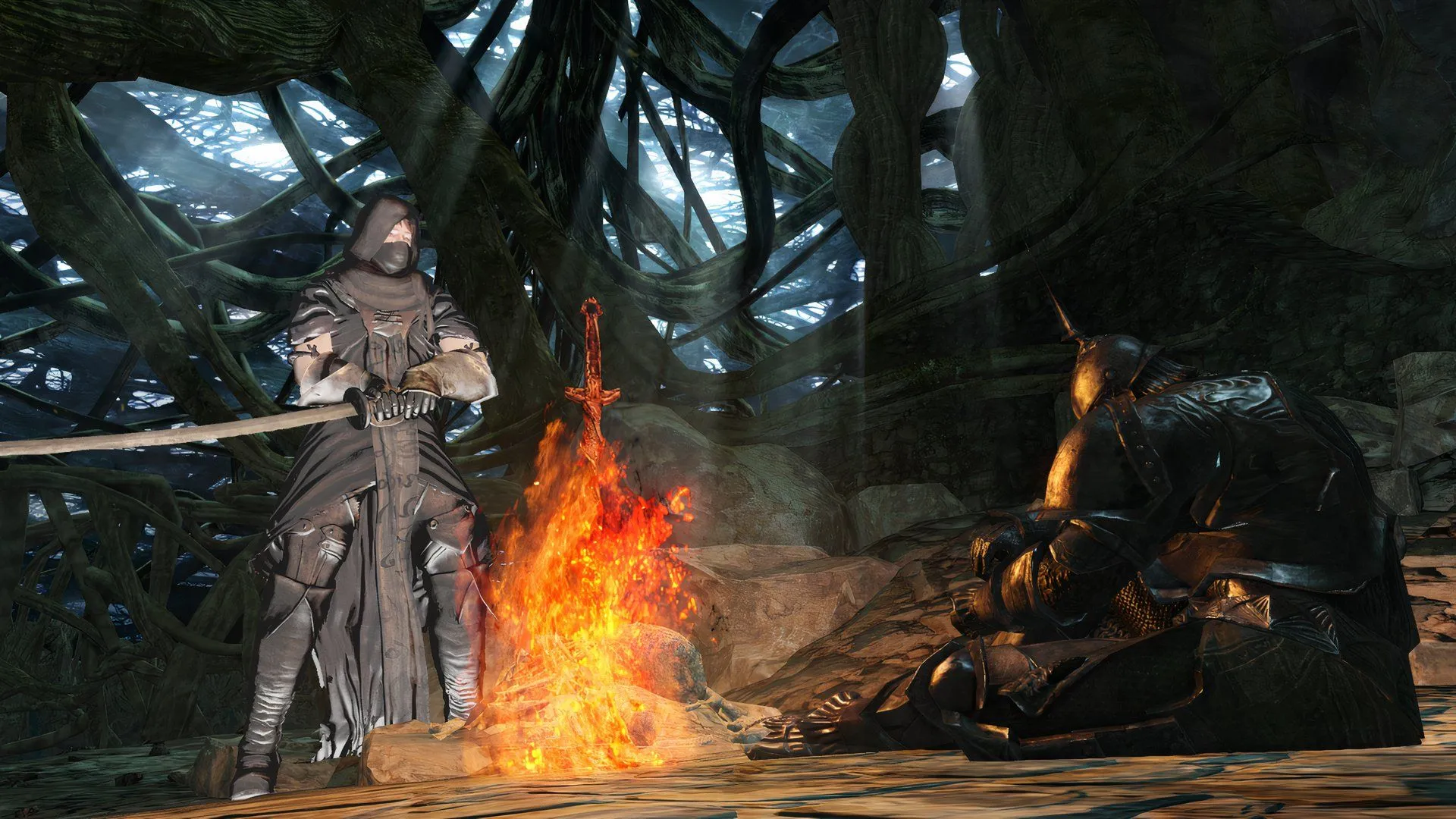 Nhân vật đang nghỉ ngơi bên đống lửa (Bonfire) trong Dark Souls 2, biểu tượng của sự an toàn tạm thời trong một thế giới đầy thử thách.