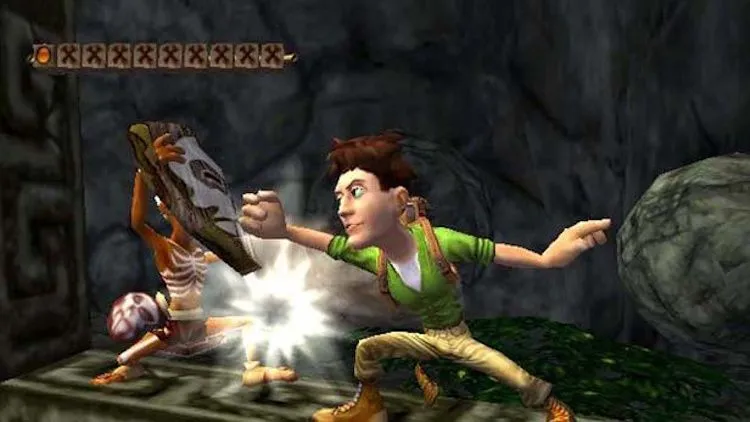 Thợ săn kho báu Harry đang đối đầu với kẻ thù trong Pitfall: The Lost Expedition.